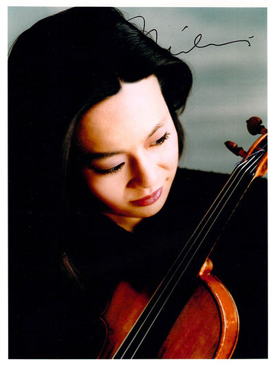 Contemplative with her instrument